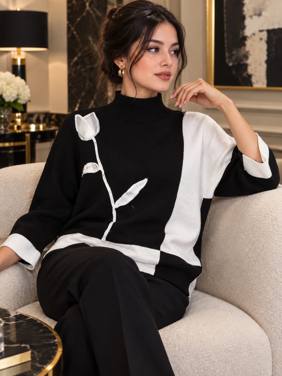 Pull noir orné de blanc ,manches 3/4, taille unique